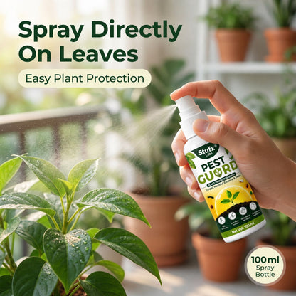 Hand holding Pest Guard spray beside a leafy plant